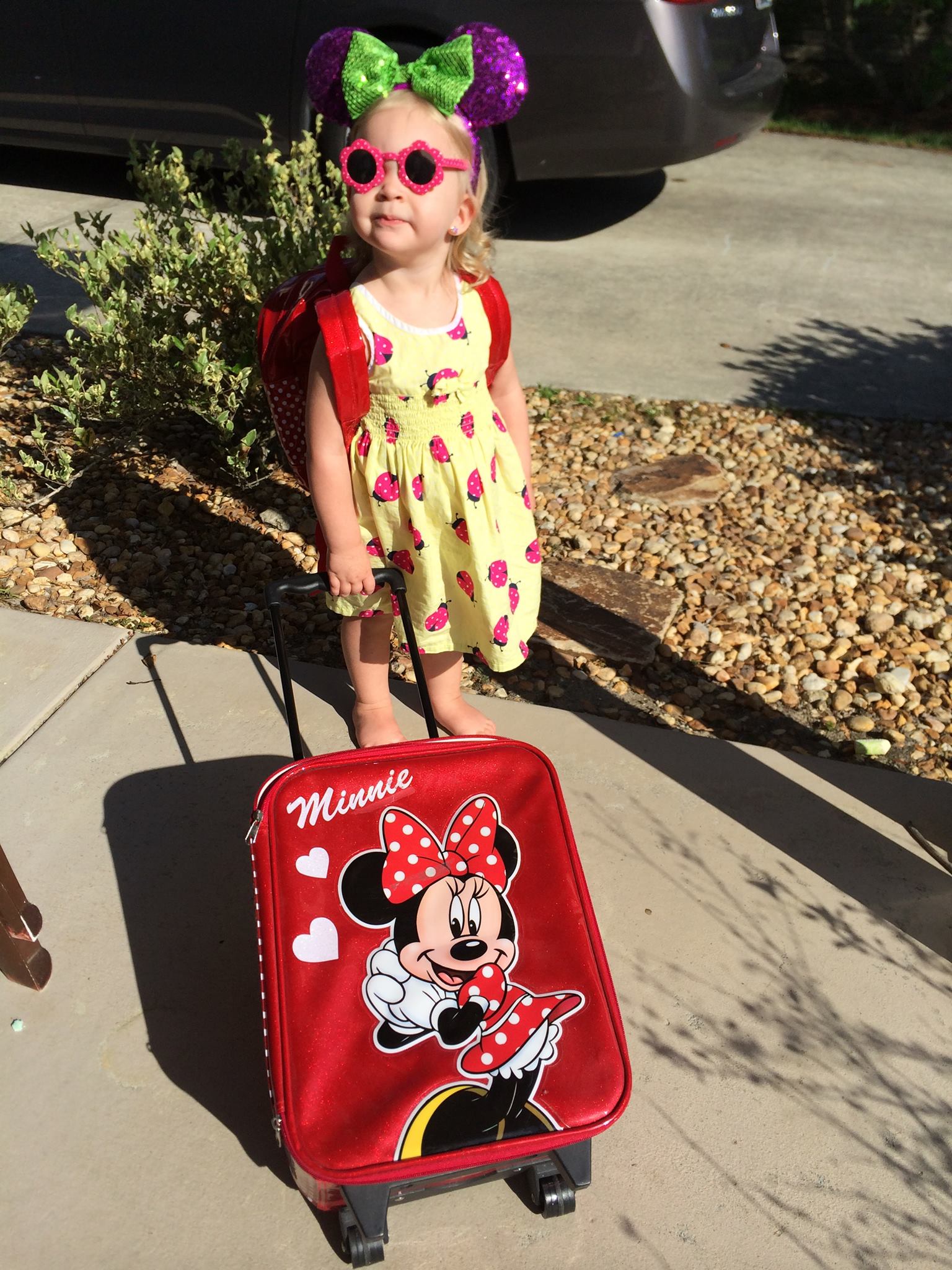 Little girl wearing Minnie ears for the Disney Parks.